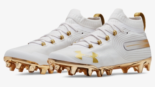 white and gold under armour cleats